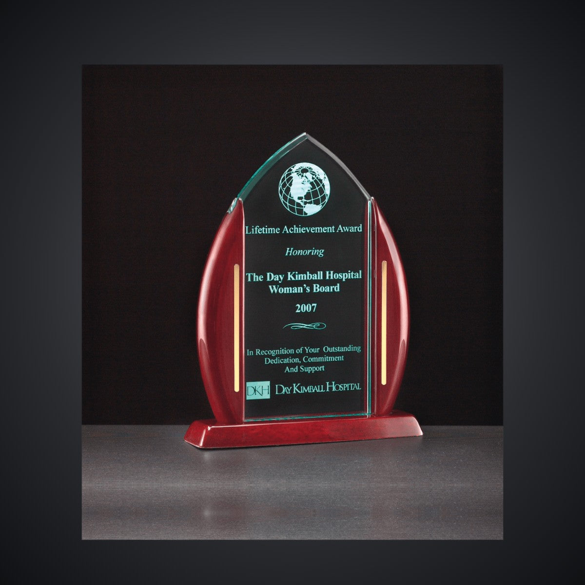 7 1/2" x 9 5/8" Flame Jade Acrylic Award with Rosewood Piano Finish Base, laser engraved with a sample name and logo layout
