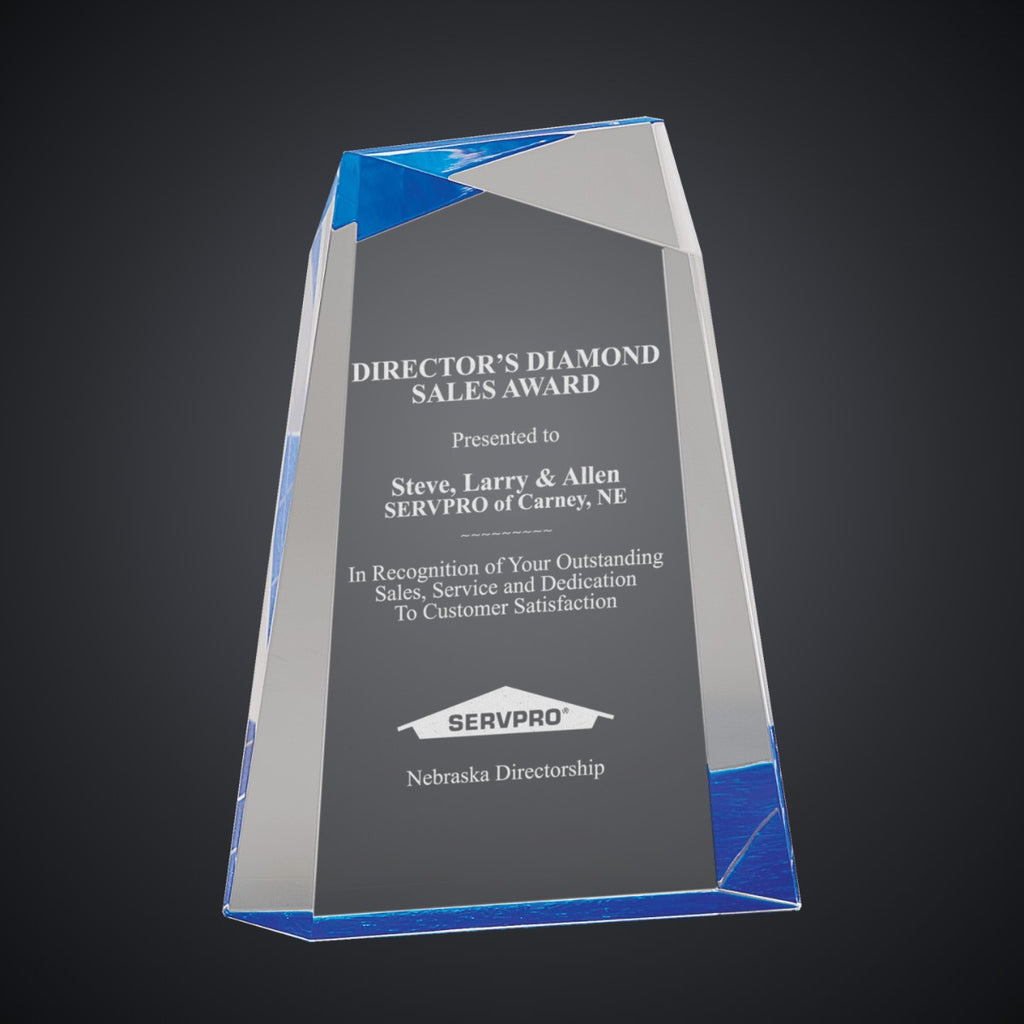 7" Blue Facet Wedge Acrylic, laser engraved with a sample name and logo layout