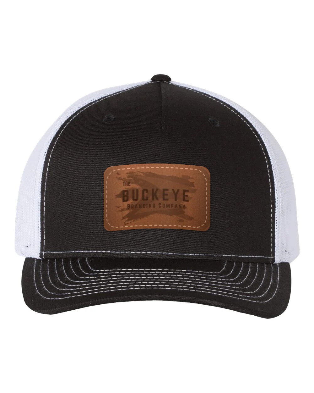 Trucker Cap 112FP in Black/White with laser-engraved leather patch (sample logo)